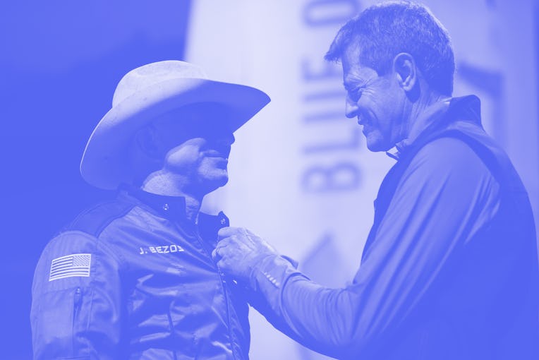 VAN HORN, TEXAS - JULY 20: Jeff Bezos receives astronaut wings from Blue Origin’s Jeff Ashby, a form...