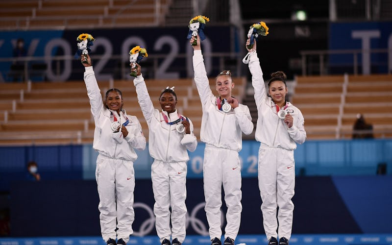Silver medalists USA's Sunisa Lee, USA's Grace Mc Callum USA's Simone Biles and USA's Jordan Chiles ...