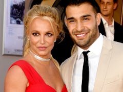 HOLLYWOOD, CALIFORNIA - JULY 22: Britney Spears (L) and Sam Asghari arrive at the premiere of Sony P...