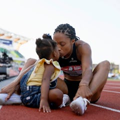 EUGENE, OREGON - JUNE 20: Allyson Felix celebrates with her daughter Camryn after finishing second i...