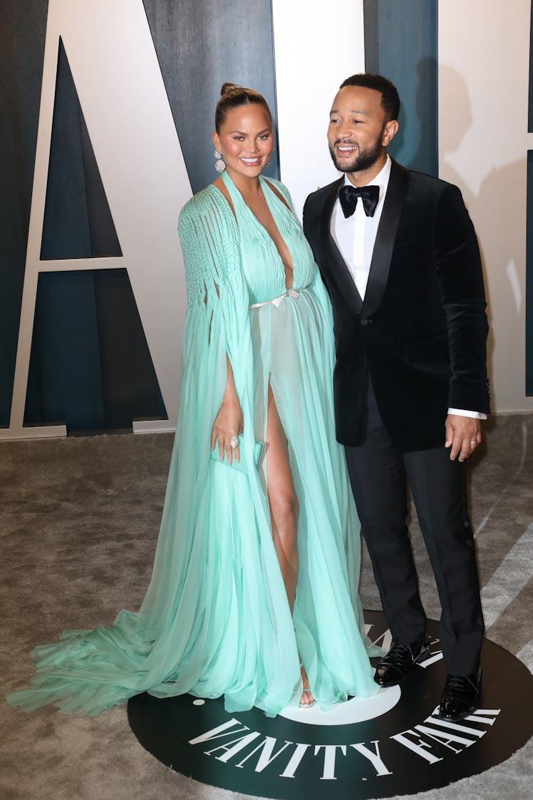 BEVERLY HILLS, CALIFORNIA - FEBRUARY 09: Chrissy Teigen and John Legend attend the 2020 Vanity Fair ...