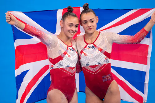 TOKYO, JAPAN - JULY 27: Twins Jennifer Gadirova and Jessica Gadirova of Great Britain after their te...