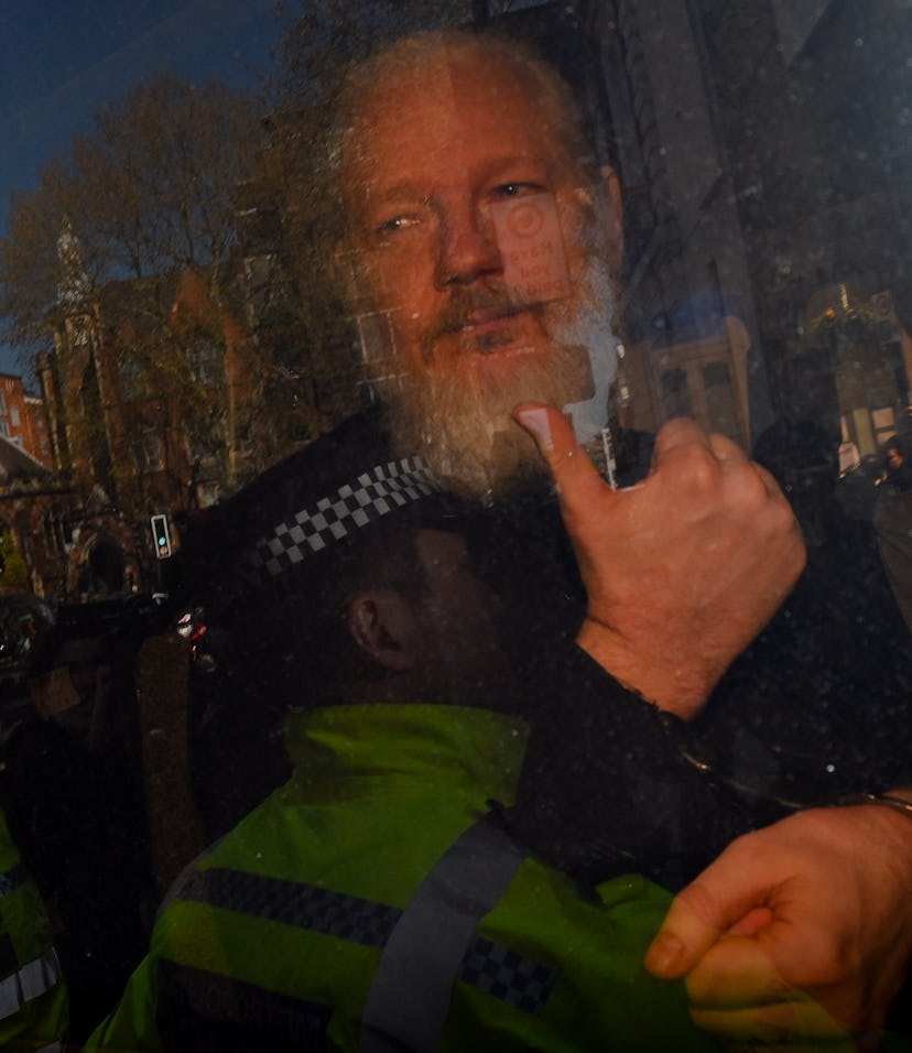 Wikileaks founder Julian Assange makes his way into the Westminster Magistrates Court after being ar...