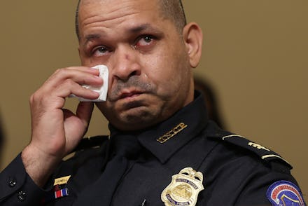 WASHINGTON, DC - JULY 27: U.S. Capitol Police officer Sgt. Aquilino Gonell becomes emotional as he t...