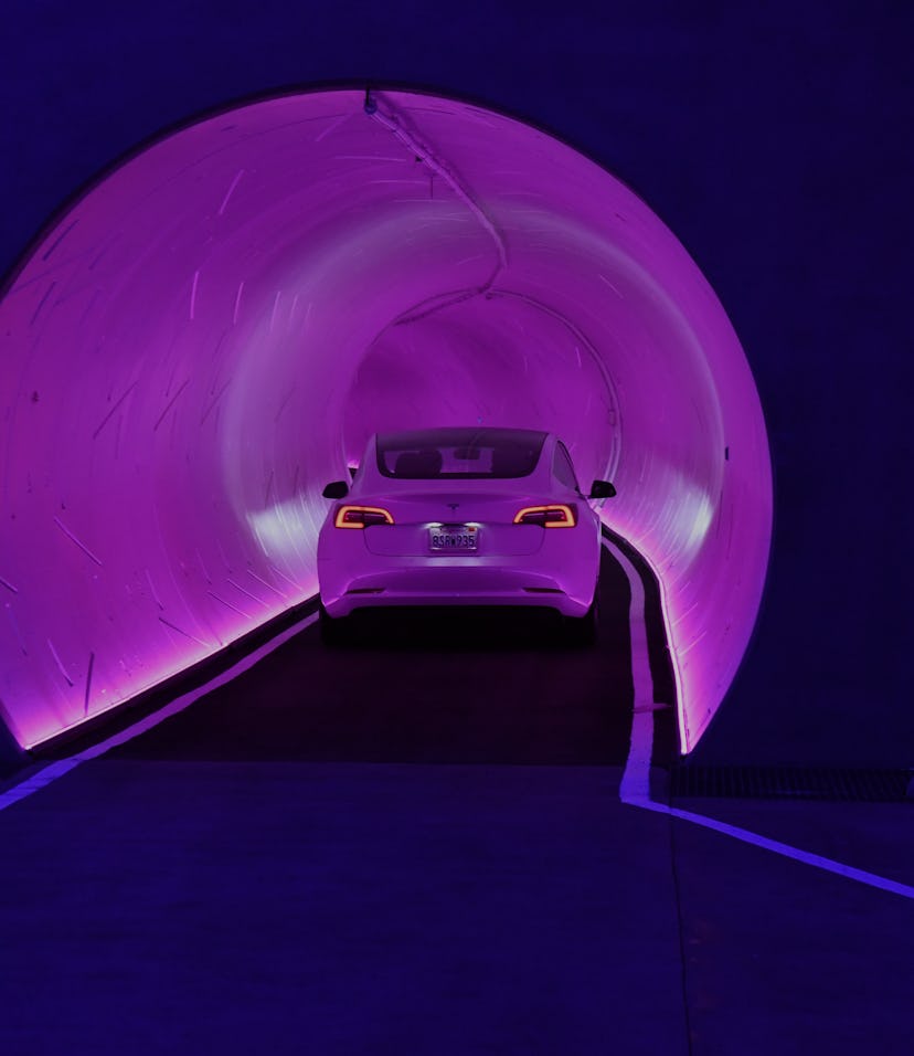 LAS VEGAS, NEVADA - APRIL 09: A Tesla car drives through a tunnel in the Central Station during a m...