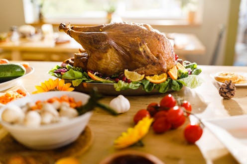 Close up of roasted stuffed turkey on Thanksgiving day.