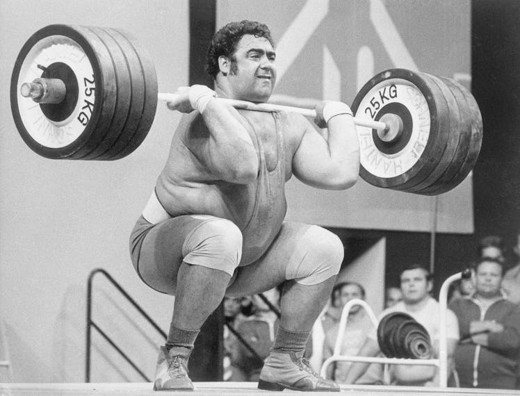Soviet Union's Vassili Alexeev sets a new Olympic world record by lifting a total of 650kg at the Mu...