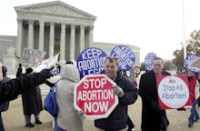 Both pro-choice and pro-life activists demonstrate in front of the US Supreme Court, 04 December, 20...