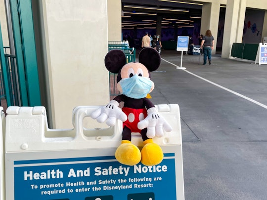 ANAHEIM, CA - APRIL 11: General views of a Mickey Mouse doll at the Disneyland Resort setup by staff...