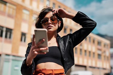 A woman decides how to let a guy down easy over text.