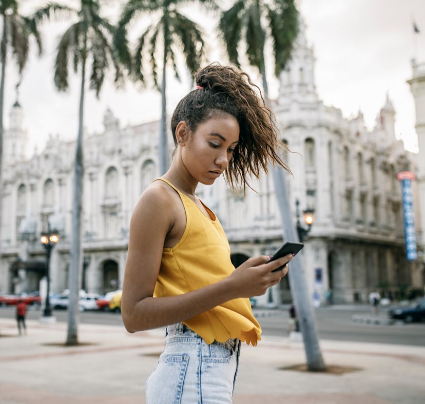 A woman uses Block Contacts to block someone she knows on Tinder.