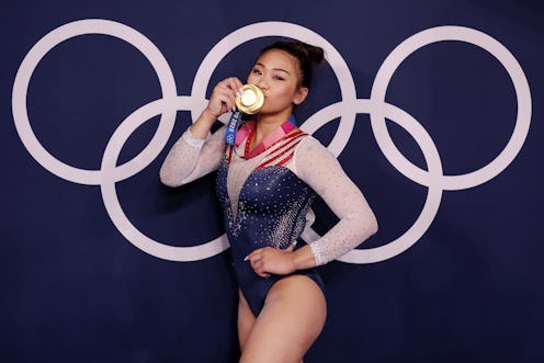 Sunisa Lee of Team United States poses with her gold medal after winning the Women's All-Around Fina...