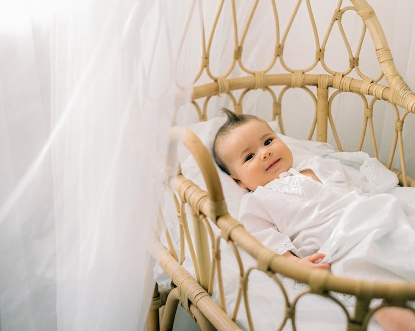 Cottagecore nurseries can include light fabrics and rattan cribs and cots.