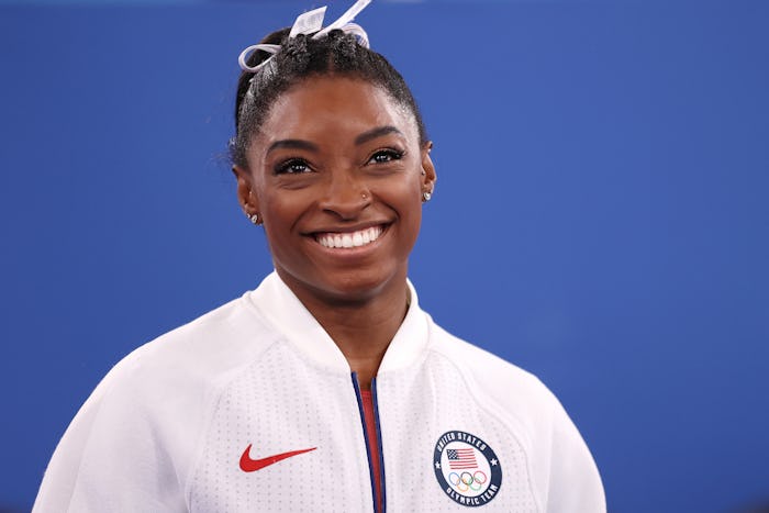 TOKYO, JAPAN - JULY 27: Simone Biles of Team United States smiles during the Women's Team Final on d...