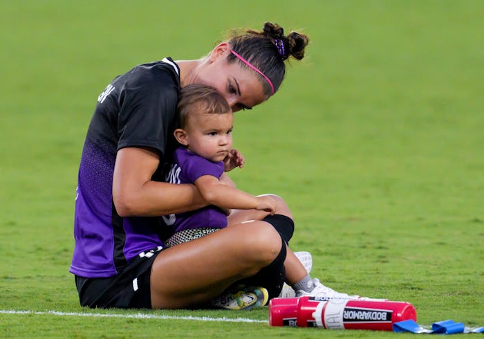 ORLANDO, FL - JUNE 20: Orlando Pride forward Alex Morgan (13) and her daughter Charlie after the NWS...