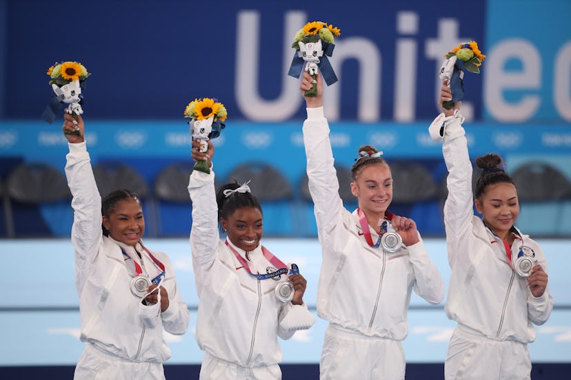 TOKYO, JAPAN - JULY 27:  The United States team with their silver medals on the podium, Jordan Chile...