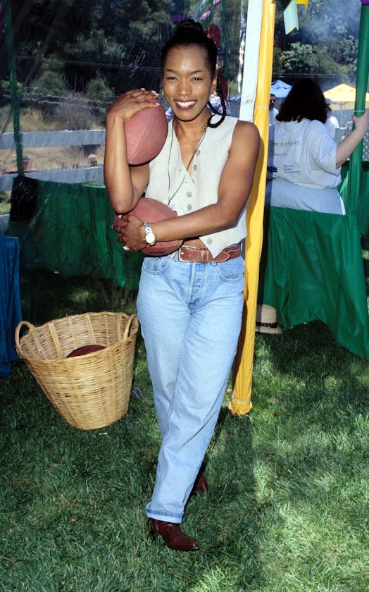 Angela Bassett in1996 wearing jeans