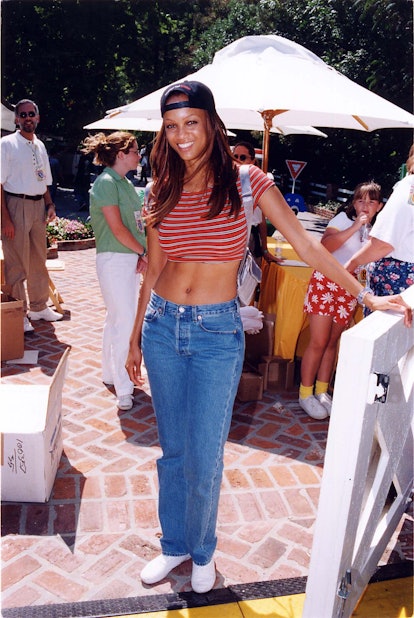 Tyra Banks in 1997 wearing jeans