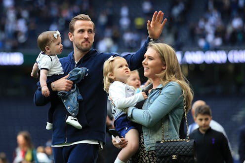 LONDON, ENGLAND - MAY 12: Harry Kane of Tottenham Hotspur walls the pitch with his family after the ...
