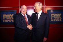 Rupert Murdoch shakes hands with Roger Ailes after naming Ailes the head of Fox News, New York, New ...