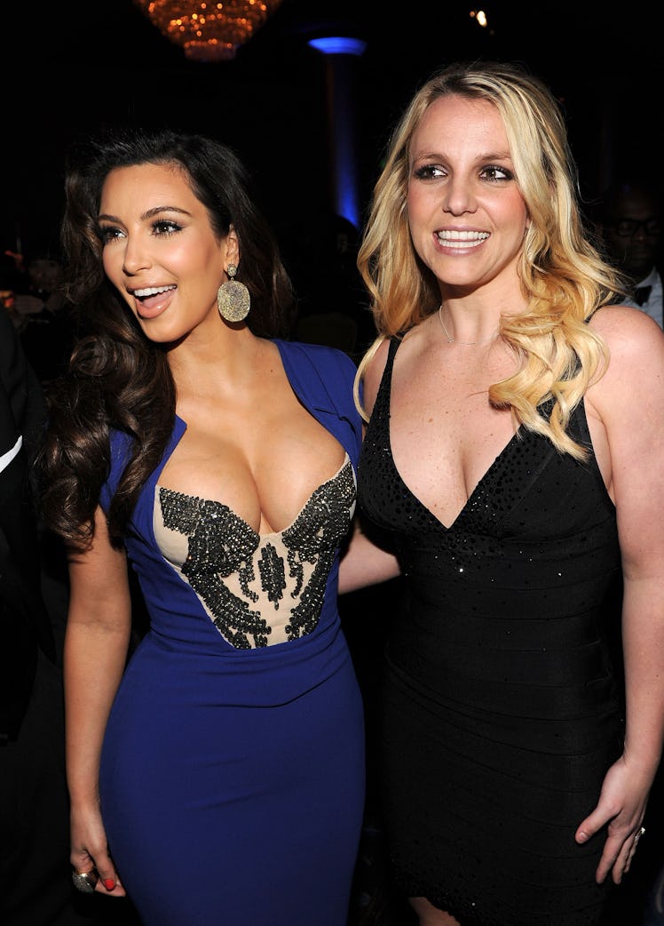 BEVERLY HILLS, CA - FEBRUARY 11: TV Personality Kim Kardashian (L) and and Singer Britney Spears at...