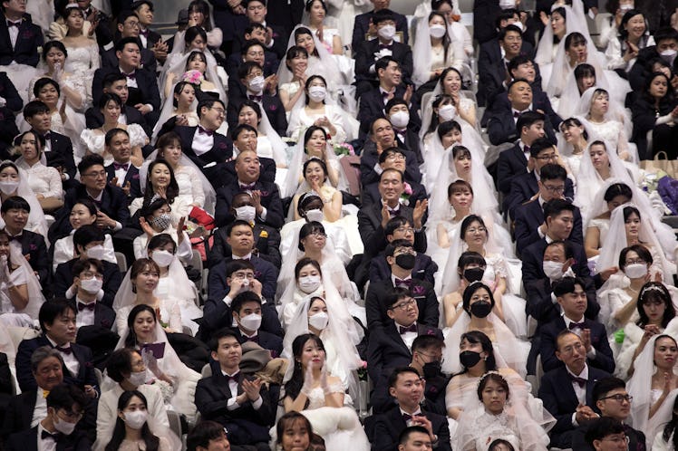 GAPYEONG-GUN, SOUTH KOREA - FEBRUARY 07: Thousands of couples attend a mass wedding held by the Fami...