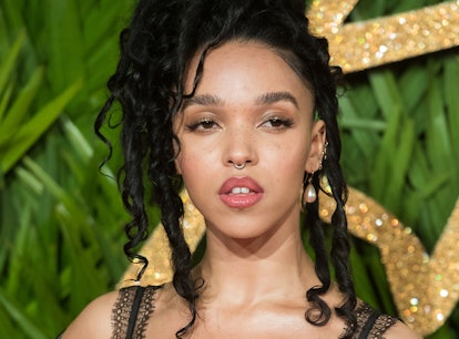 LONDON, ENGLAND - DECEMBER 04:  FKA Twigs attends The Fashion Awards 2017 in partnership with Swarov...