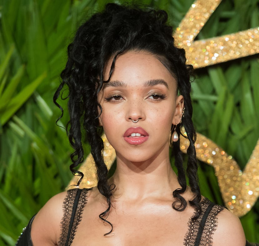 LONDON, ENGLAND - DECEMBER 04: FKA Twigs attends The Fashion Awards 2017 in partnership with Swarov...