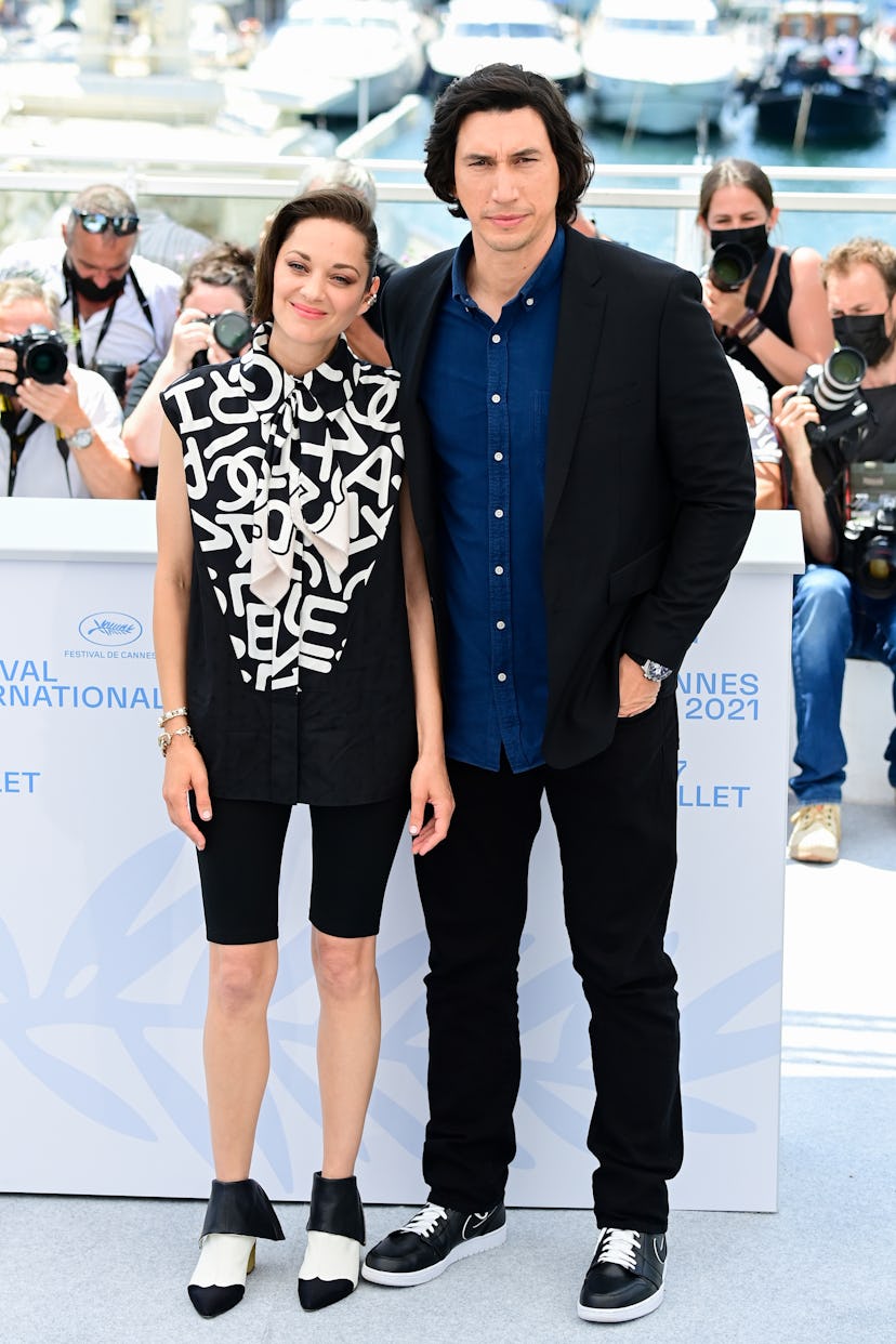 CANNES, FRANCE - JULY 06: Marion Cotillard and Adam Driver attend the "Annette" photocall during the...