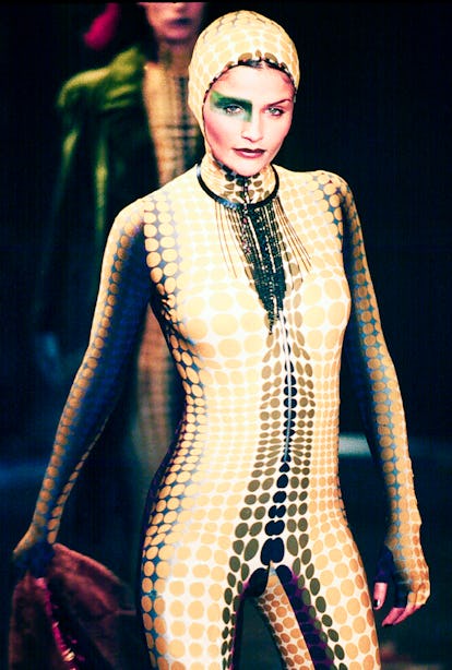 PARIS, FRANCE - MARCH 06: Helena Christensen walks the runway during the Jean Paul Gaultier Ready to Wear Fall/Winter 1995-1996 fashion show as part of the Paris Fashion Week on March 6, 1995 in Paris, France. (Photo by Victor VIRGILE/Gamma-Rapho via Getty Images)