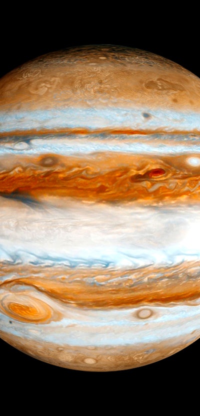Jupiter gas giant slowly orbiting in deep space concept