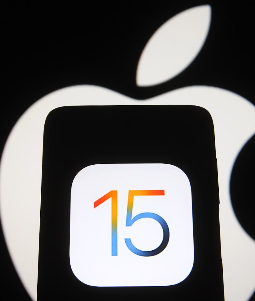 UKRAINE - 2021/06/07: In this photo illustration the iOS 15 logo is seen on a smartphone with an App...