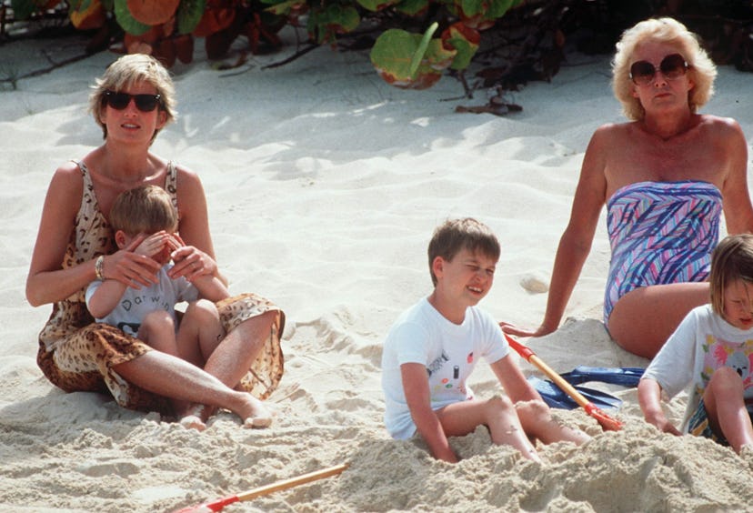 Princess Diana with her sons on the beach.