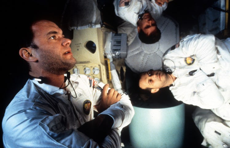 Tom Hanks, Kevin Bacon, and Bill Paxton in zero gravity in a scene from the film 'Apollo 13', 1995. ...