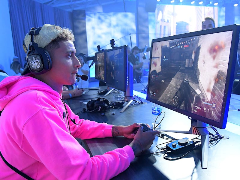 LOS ANGELES, CA - AUGUST 01:  Basketball star Kyle Kuzma plays the new the Call of Duty: Modern Warf...