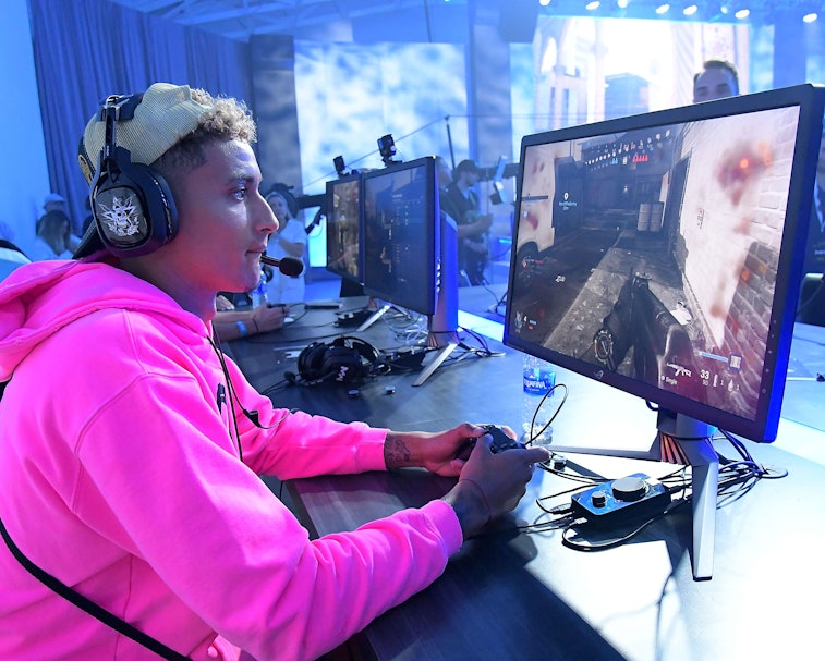 LOS ANGELES, CA - AUGUST 01:  Basketball star Kyle Kuzma plays the new the Call of Duty: Modern Warf...