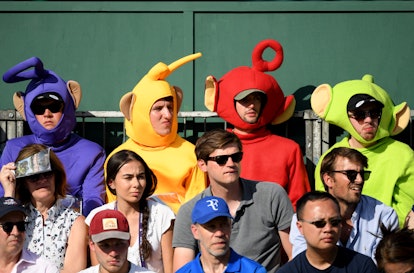LONDON, ENGLAND - JULY 02: Spectators dressed as the Teletubbies looks on from the stand during Day ...