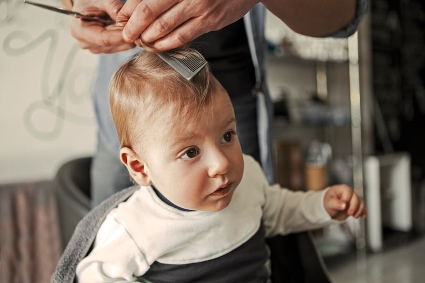 Baby getting his first haircut at hairdresser in article about one-syllable boy names