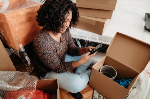 A woman reads an article via Instagram link sticker. Why don't I have swipe ups? Instagram is puttin...