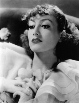Joan Crawford's wispy bangs of the 1930s mark a departure from the previous decade's style.