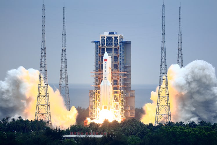 WENCHANG, CHINA - APRIL 29: A Long March-5B Y2 rocket carrying the core module of China's space stat...