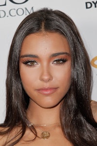 Madison Beer with heavy lashes and warm eyeshadow at the start of her career and beauty evolution