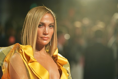 Jennifer Lopez, shown here at an event in a gold gown, is living her best life, as seen in her new m...