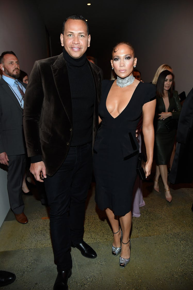 HOLLYWOOD, CALIFORNIA - FEBRUARY 07: (L-R) Alex Rodriguez and Jennifer Lopez attend the Tom Ford AW2...