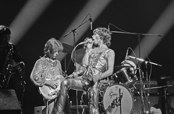 English singer Mick Jagger (right) of the Rolling Stones performs with guitarist Mick Taylor at the Empire Pool in Wembley, during the group's 1973 European Tour, London, UK, 7th September 1973.  (Photo by Evening Standard/Hulton Archive/Getty Images)