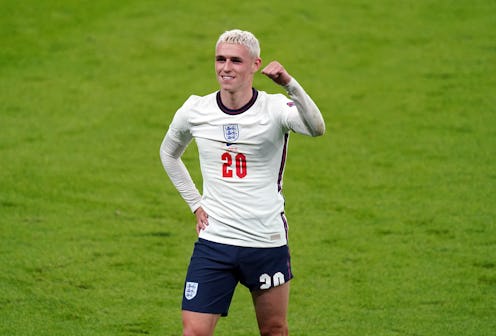 Englands Phil Foden celebrates winning the UEFA Euro 2020 semi final match at Wembley Stadium, Londo...
