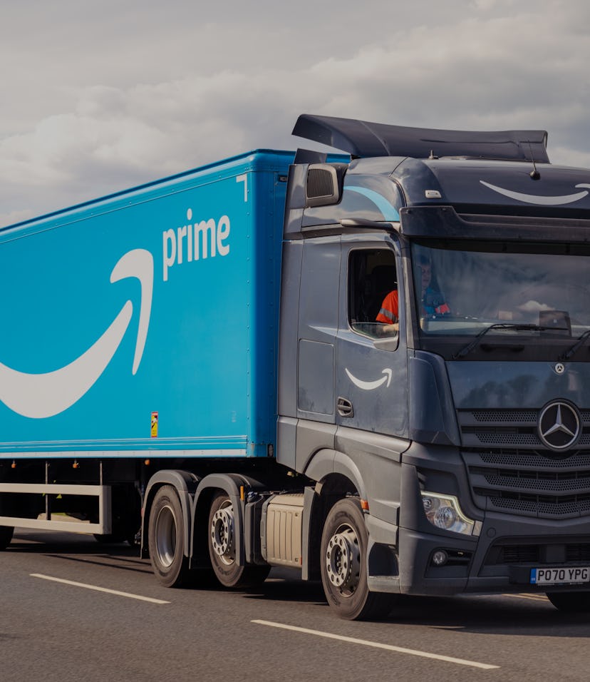Milton Keynes, UK - A large Amazon Prime delivery lorry on the road.