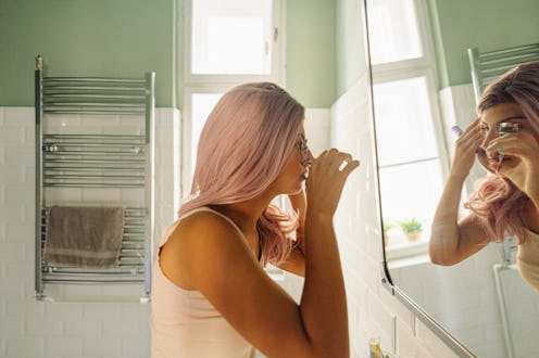 It's hard to apply eyelash extensions at home, but these pro tips (including curling your eyelashes ...