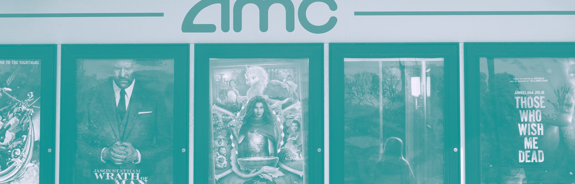 CHICAGO, ILLINOIS - JUNE 01: Movie poster of current offerings are displayed on the front of an AMC ...