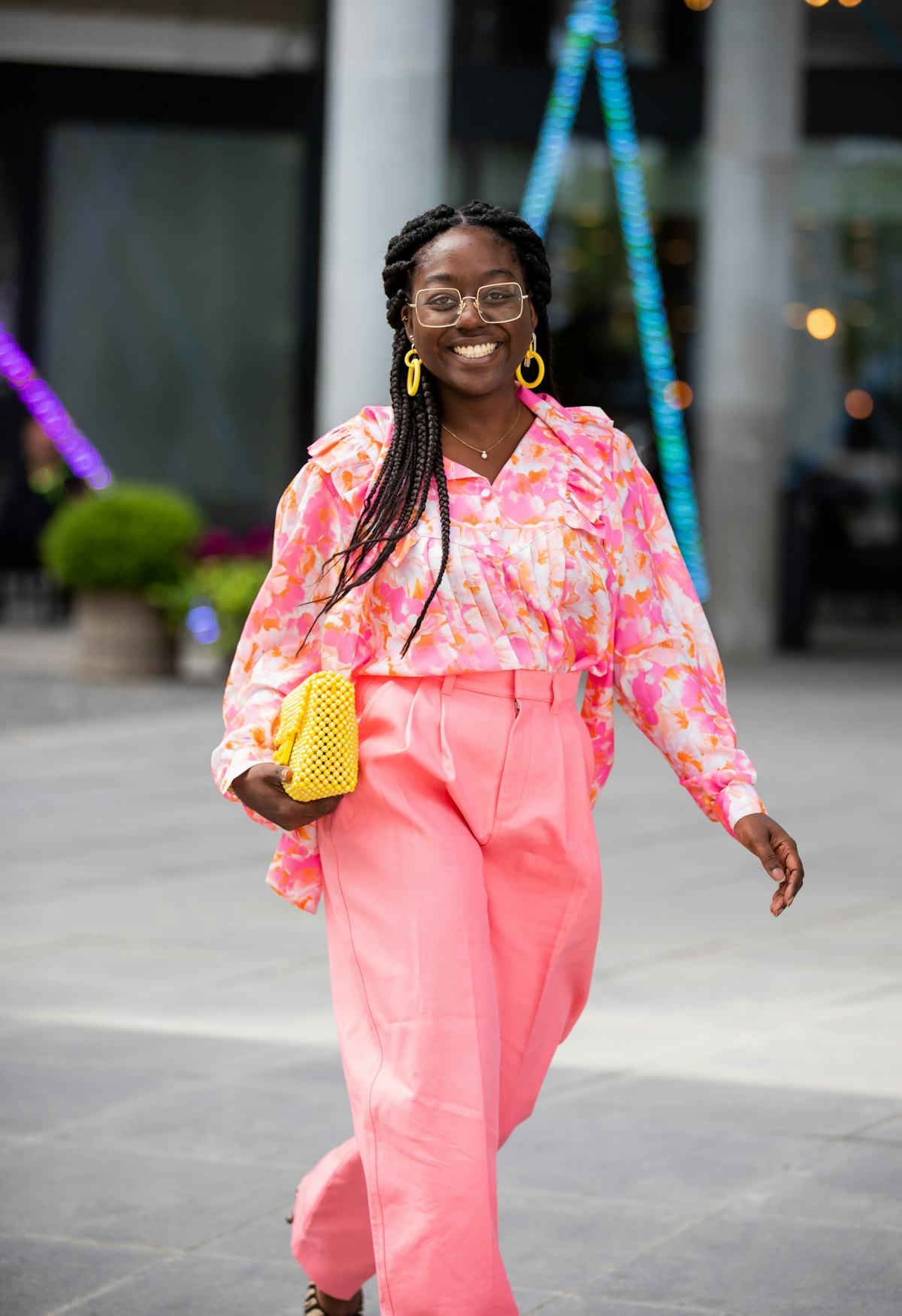 COPENHAGEN, DENMARK - AUGUST 11: Lois Opoku seen wearing pink pants, yellow Chanel bag outside Brøgg...